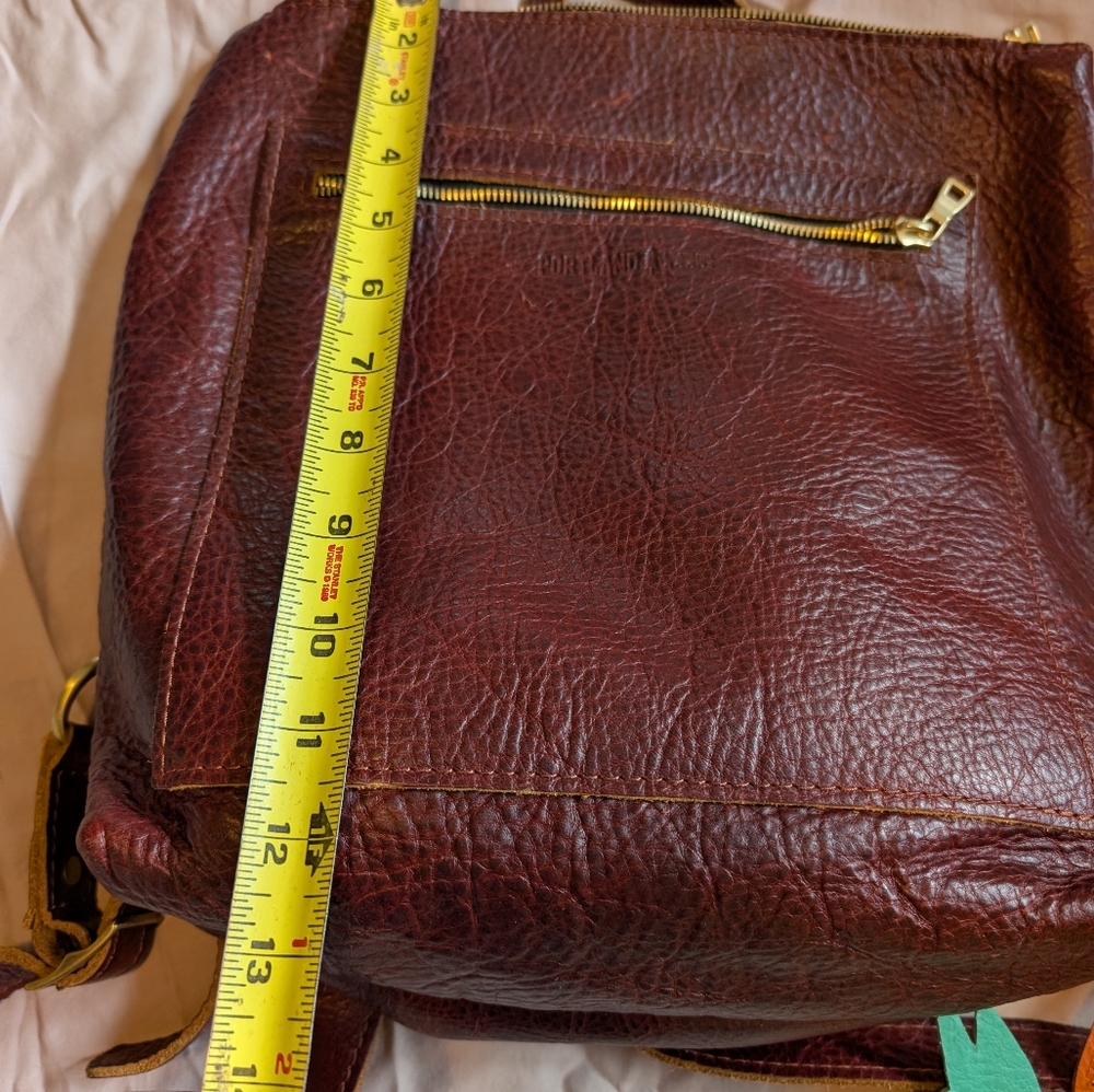 Portland Brown Leather Backpack with Front Zip Pocket With llama  Accessorie